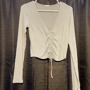Lightly used baby blue slightly cropped long sleeve